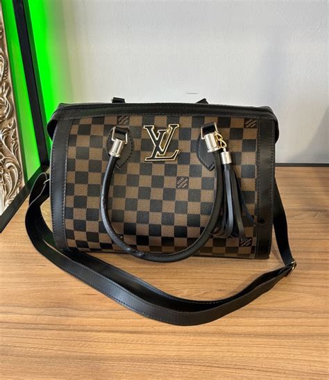 bolsa bau louis vuitton|Louis Vuitton crocodile.